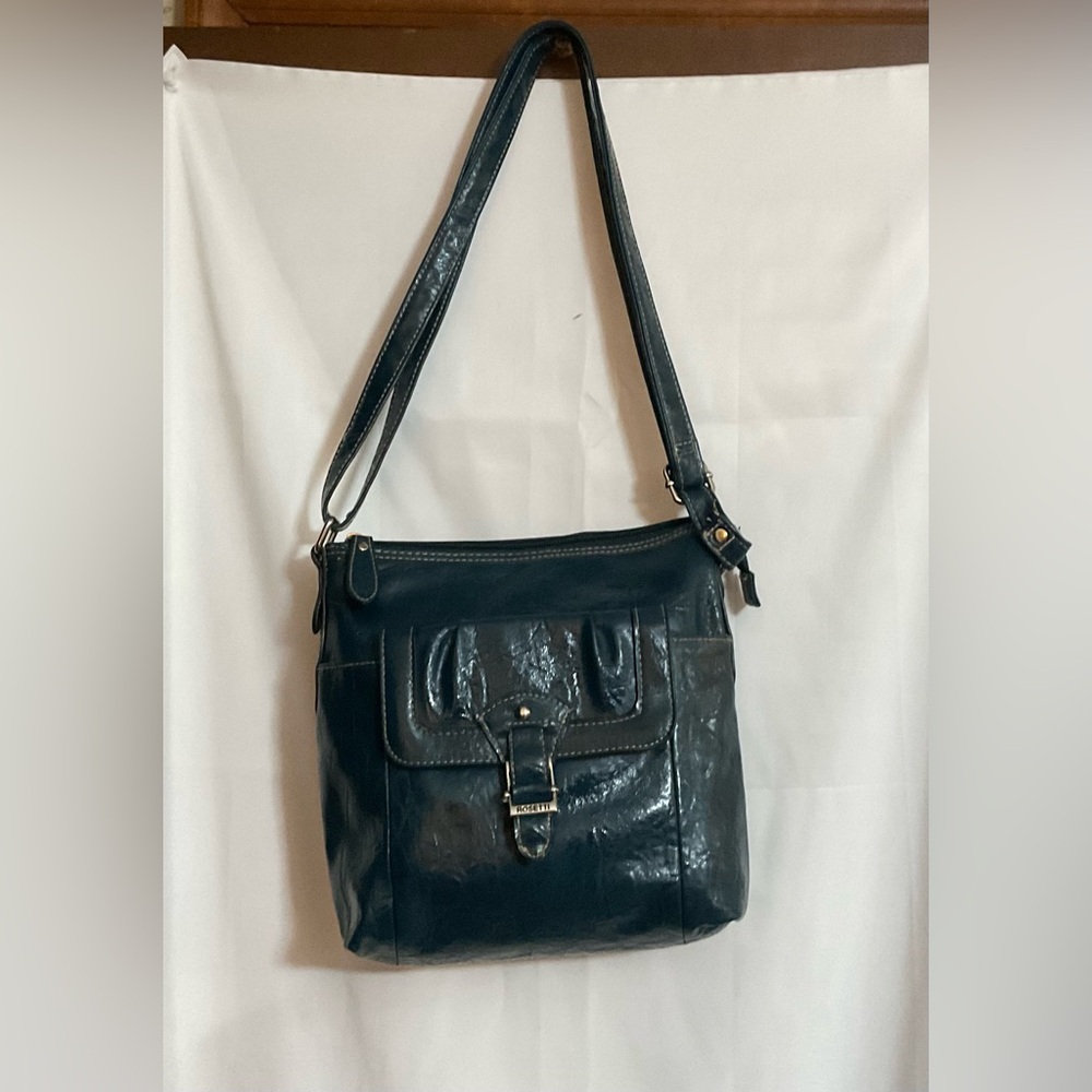 RossettiTeal adjustable cross body adjustable causal 100% polyvinyl chloride bag